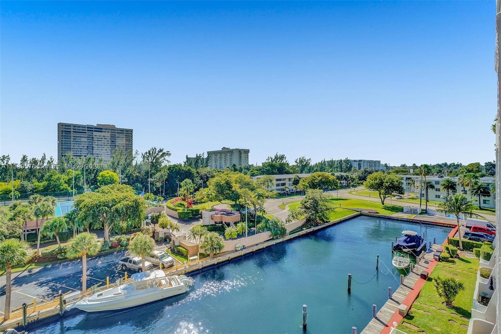 1650 Northeast 115th Street, Unit 102 Miami, FL 33181 - Photo 35 of 35 a view of a lake with a mountain view