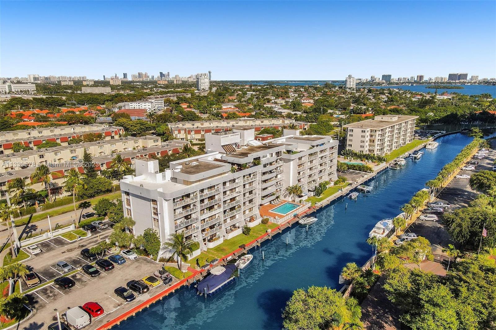 1650 Northeast 115th Street, Unit 102 Miami, FL 33181 - Photo 6 of 35 a view of a city with an ocean view