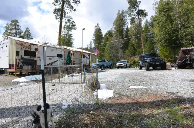 a view of a house with snow on the ground