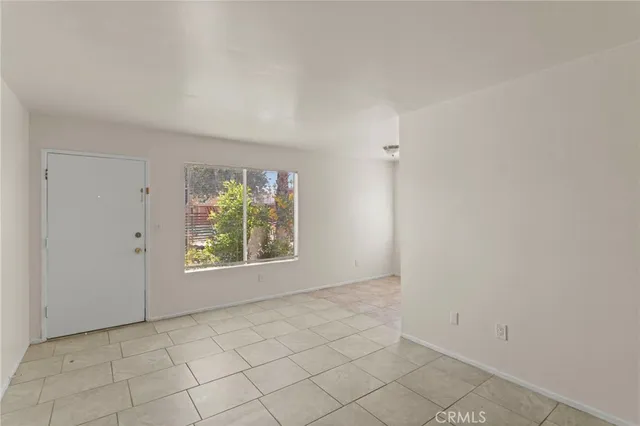 a bathroom with a sink a mirror and a window