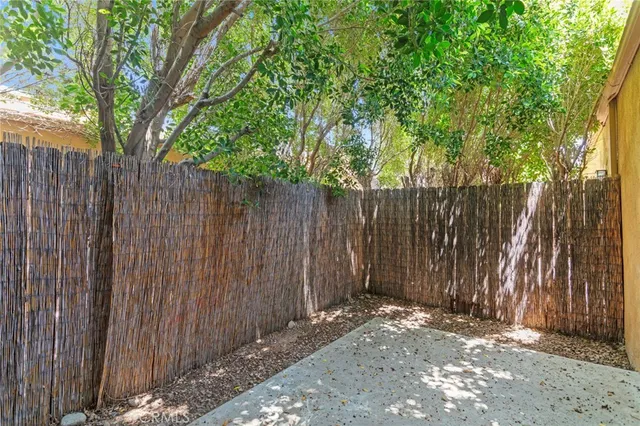a backyard of a house with trees