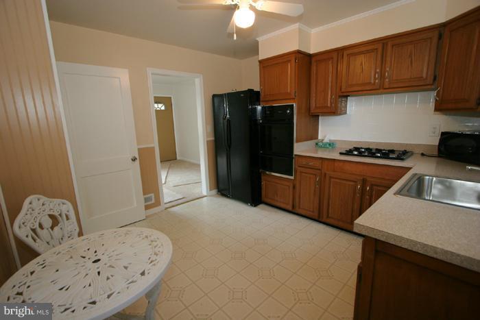 5525 Heatherwood Road Halethorpe, MD 21227 - Photo 3 of 15 Kitchen