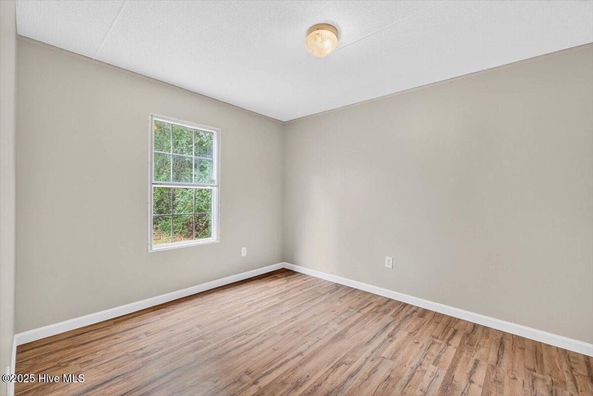 7015 Kingtown Road Northwest Ash, NC 28420 - Photo 27 of 29 Guest Room Rear
