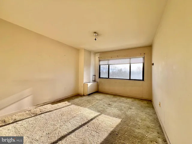 $100,000 | 8830 Piney Branch Road, Unit 402, Silver Spring, MD 20903