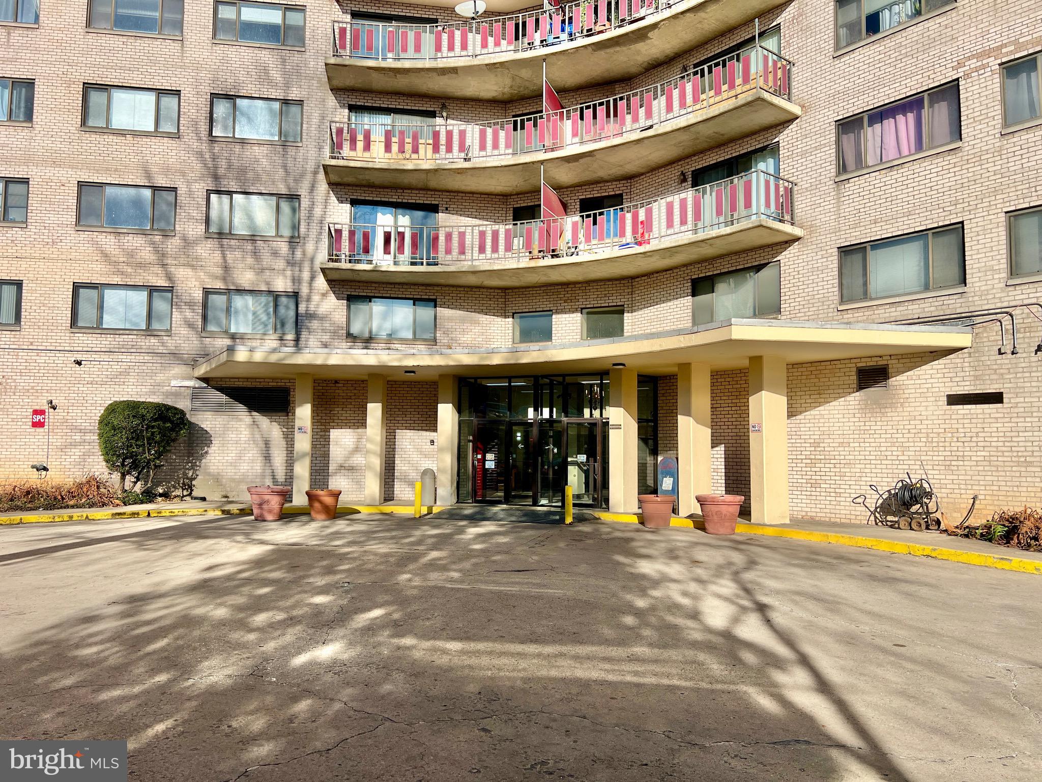 8830 Piney Branch Road, Unit 402 Silver Spring, MD 20903 - Photo 22 of 23 a view of a building with retail shops