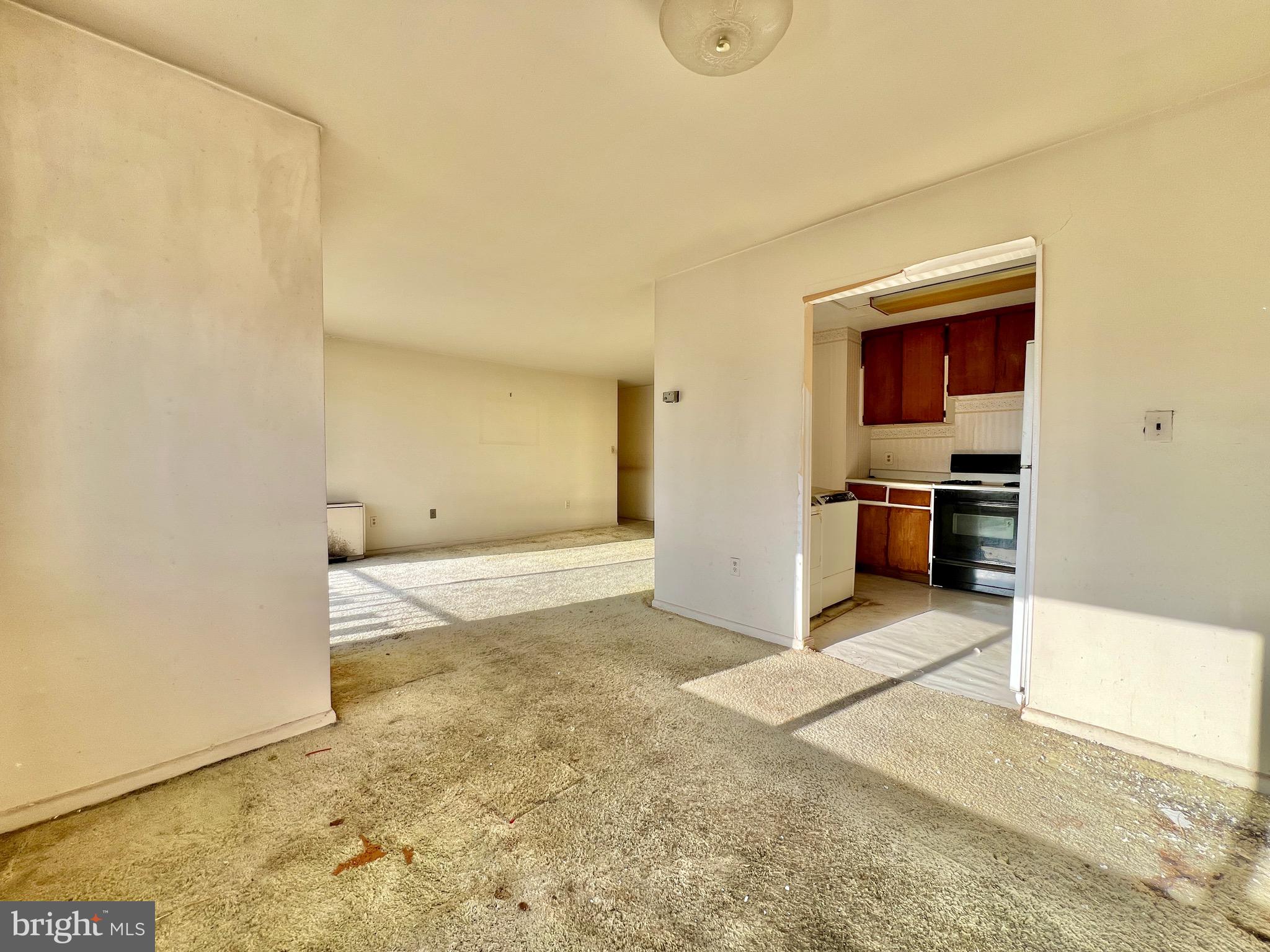 8830 Piney Branch Road, Unit 402 Silver Spring, MD 20903 - Photo 8 of 23 a view of kitchen with refrigerator oven