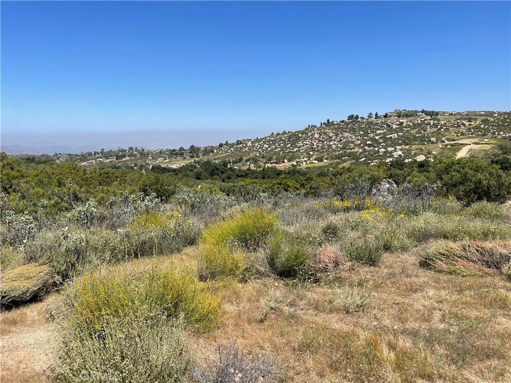 0 Tanager Hemet, CA 92544 - Photo 3 of 17 a view of a lake with a building in the background