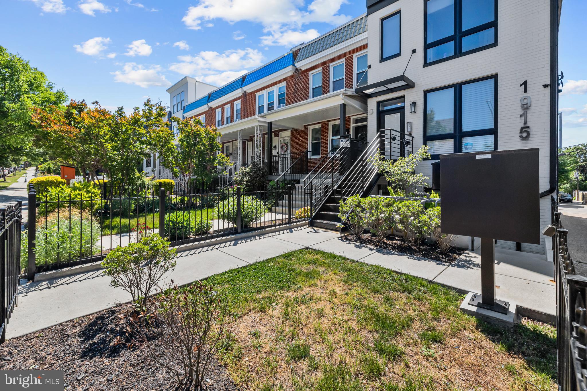 1915 H Street Northeast, Unit PH1 Washington, DC 20002 - Photo 21 of 21 a view of a building with a garden