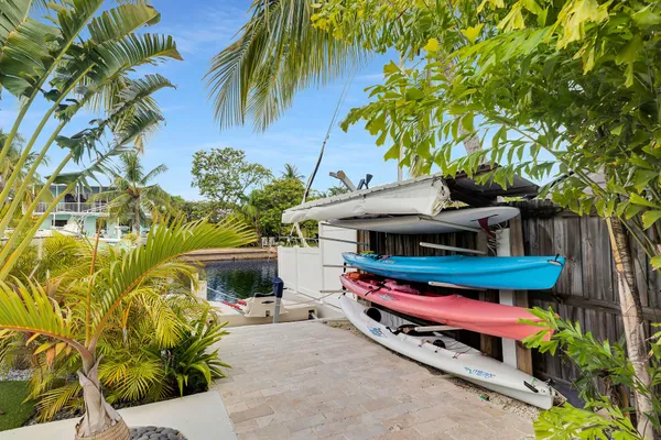 a bathroom with a sink toilet and mirror