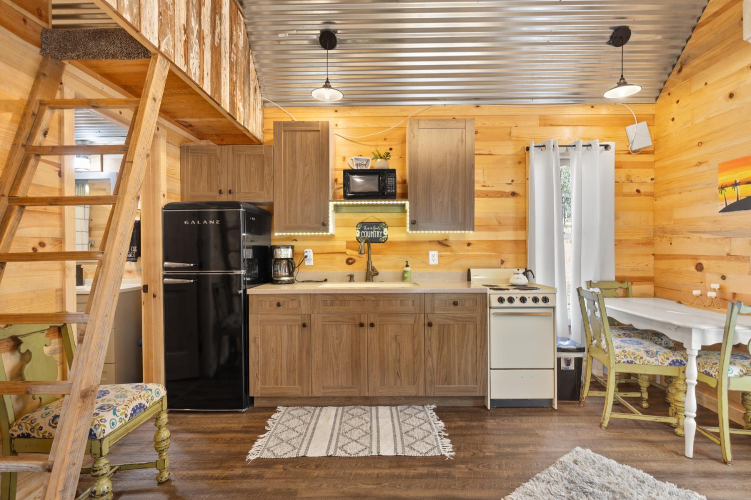 45 Lighthouse Lane Bangor, CA 95901 - Photo 51 of 63 a kitchen with refrigerator and cabinets
