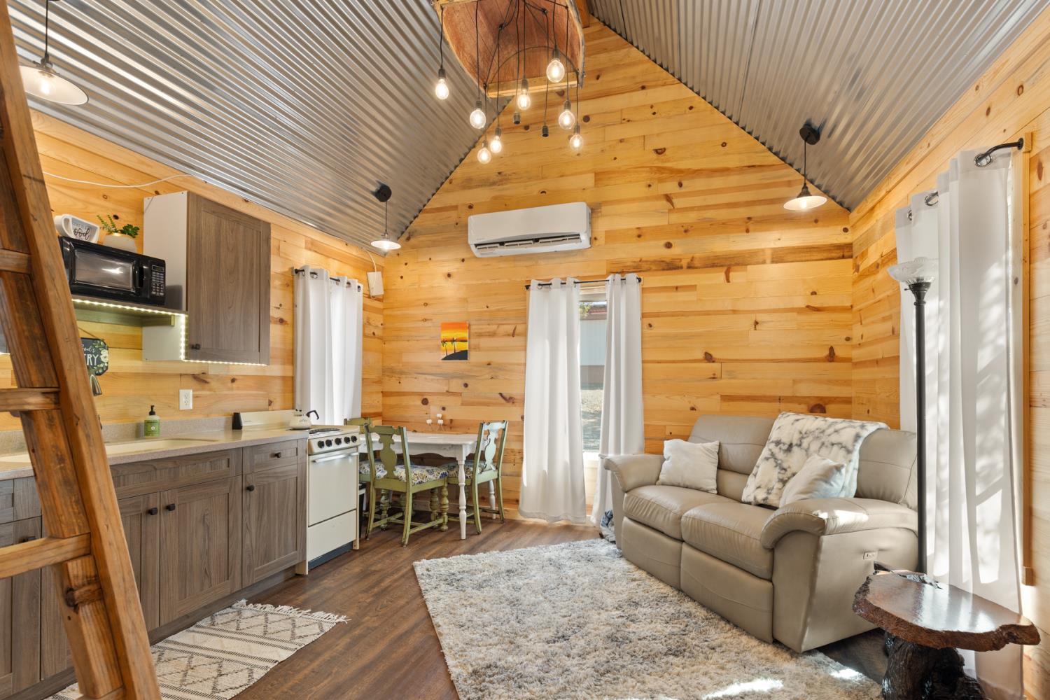 45 Lighthouse Lane Bangor, CA 95901 - Photo 52 of 63 a living room with patio furniture and a chandelier