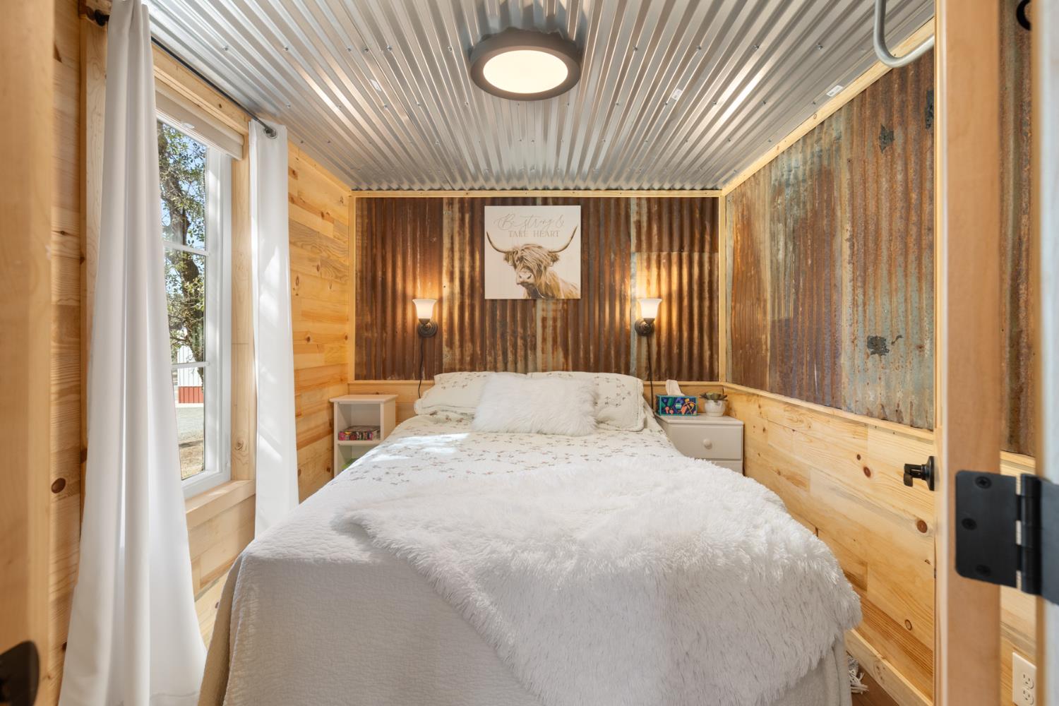 45 Lighthouse Lane Bangor, CA 95901 - Photo 53 of 63 a bedroom with a bed and a window