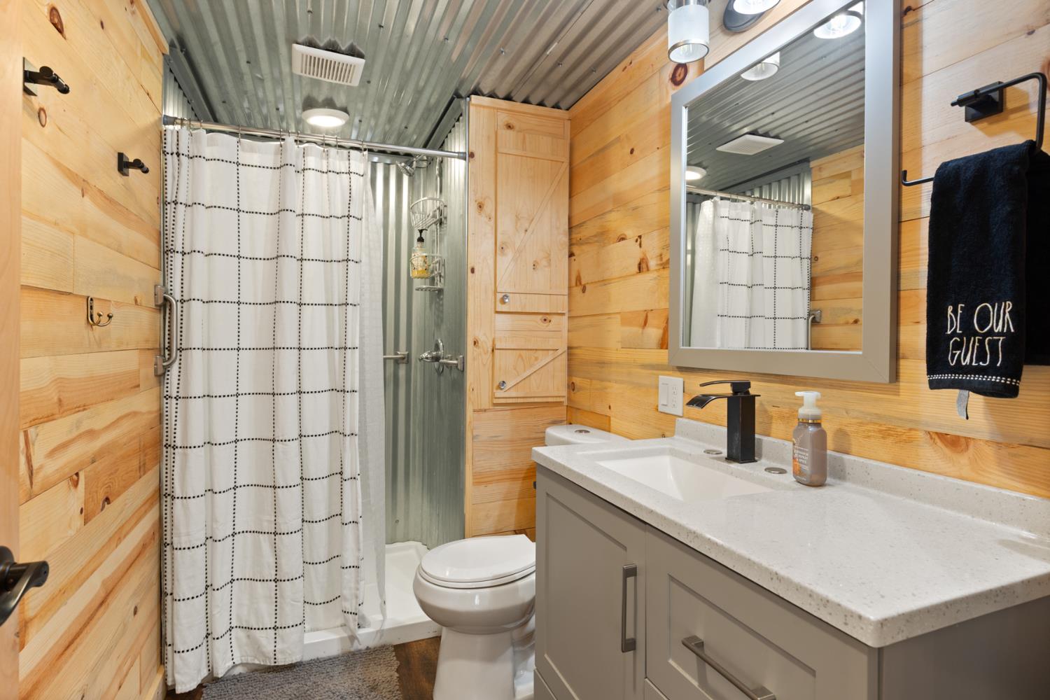 45 Lighthouse Lane Bangor, CA 95901 - Photo 54 of 63 a bathroom with a sink a toilet and shower