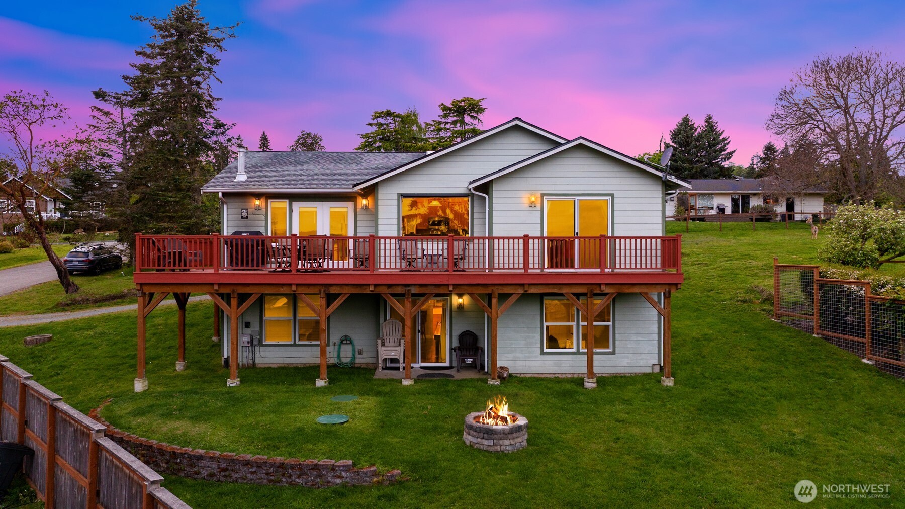 1409 Commodore Place Freeland, WA 98249 - Photo 1 of 38 a front view of a house with garden