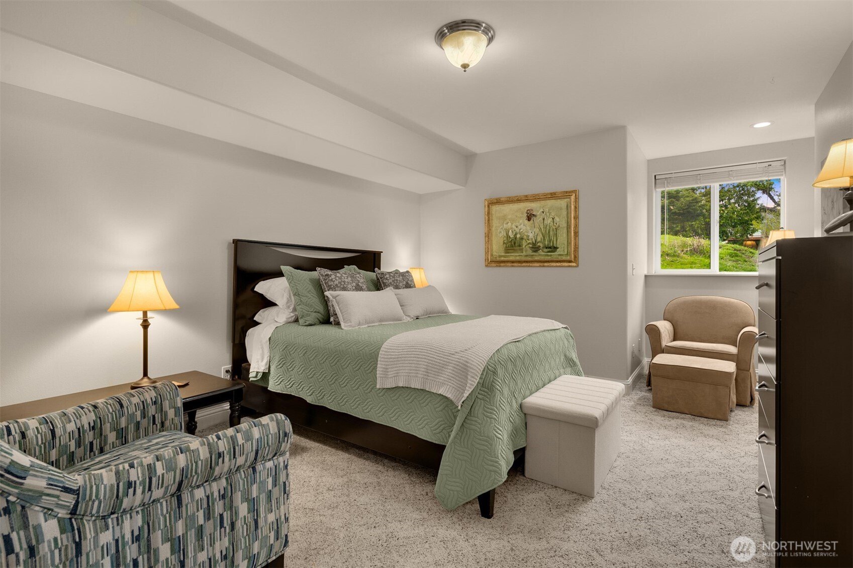 1409 Commodore Place Freeland, WA 98249 - Photo 25 of 38 a bedroom with bed couch and window