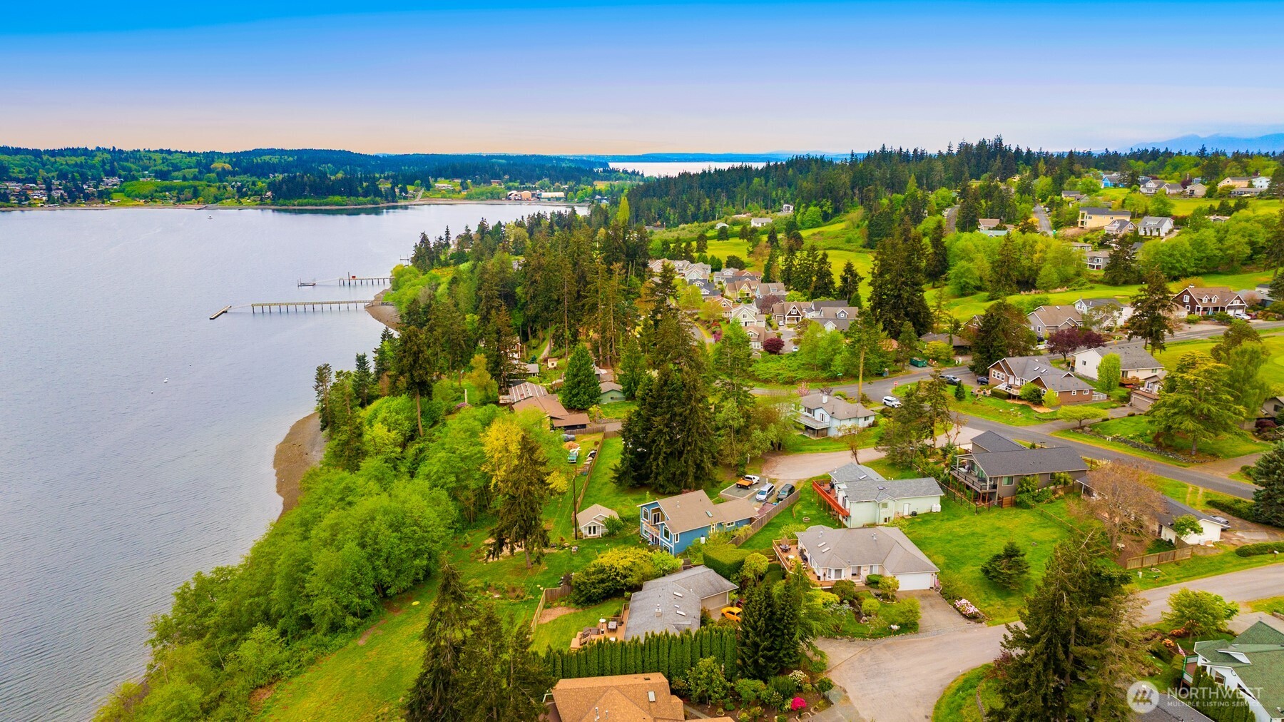 1409 Commodore Place Freeland, WA 98249 - Photo 5 of 38 a view of a lake with a city