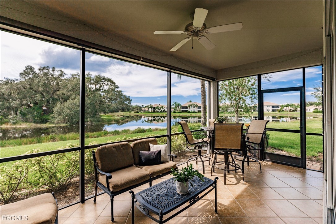 13120 Pebblebrook Point Circle, Unit 102 Fort Myers, FL 33905 - Photo 38 of 50 a view of a porch with furniture and a yard
