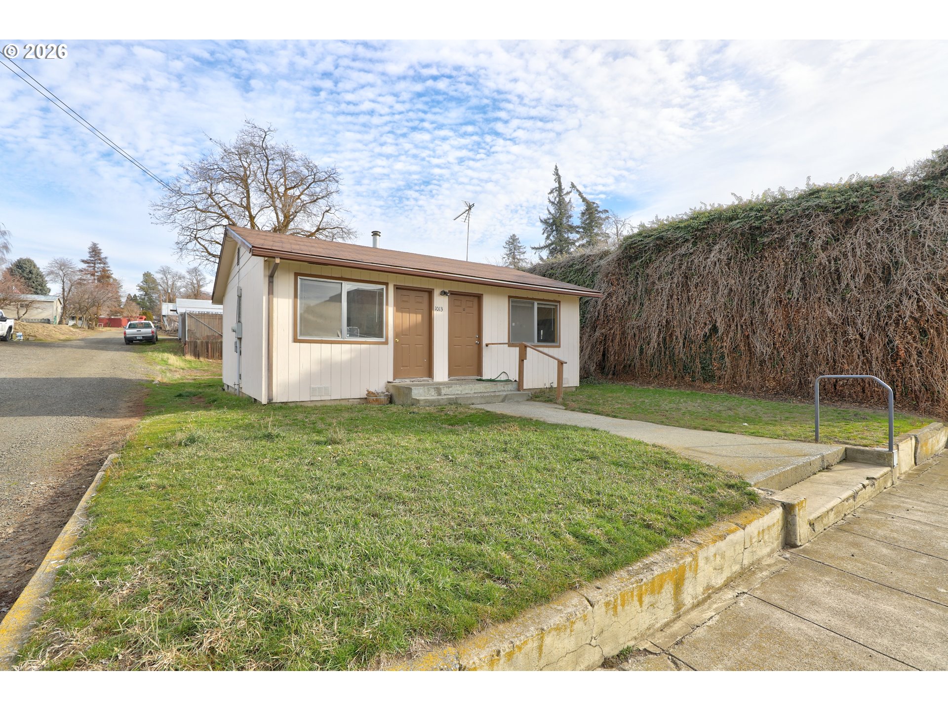 a view of a backyard with a garden