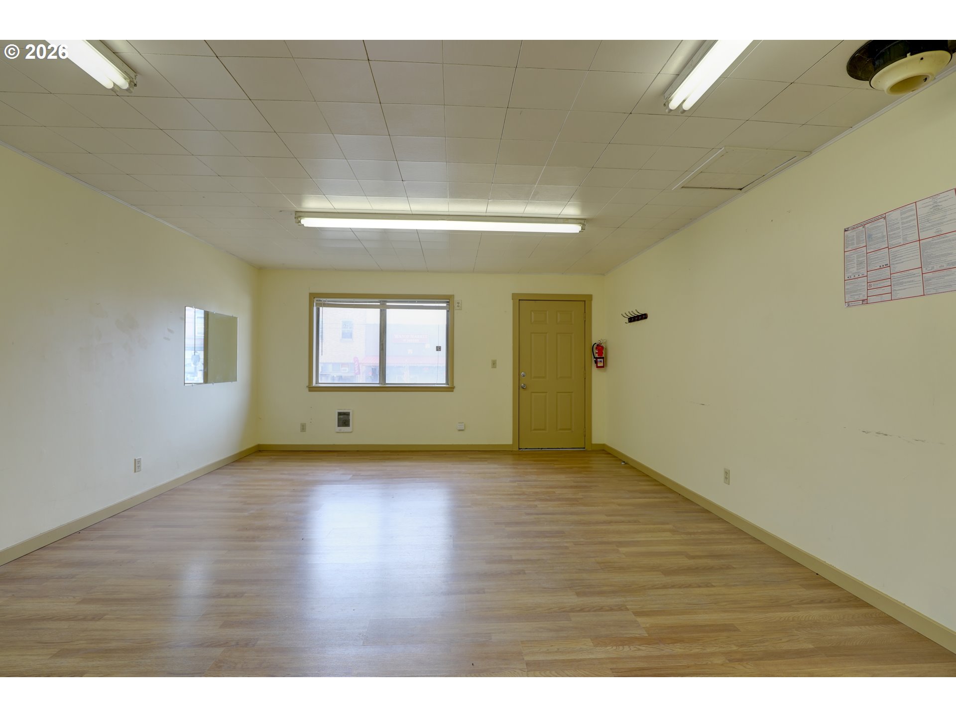 1013 Clark Street Wasco, OR 97065 - Photo 13 of 19 a view of empty room with wooden floor and fan