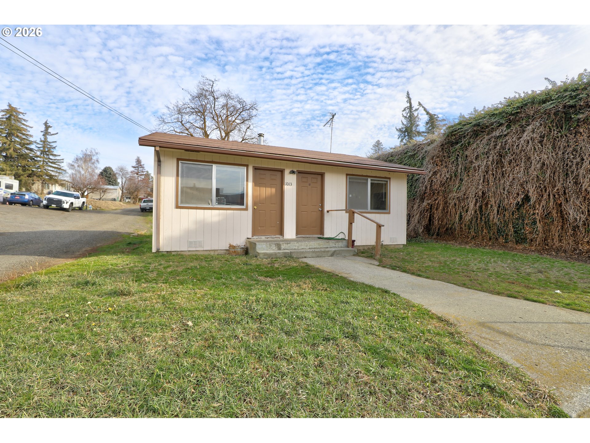 1013 Clark Street Wasco, OR 97065 - Photo 15 of 19 a front view of a house with garden