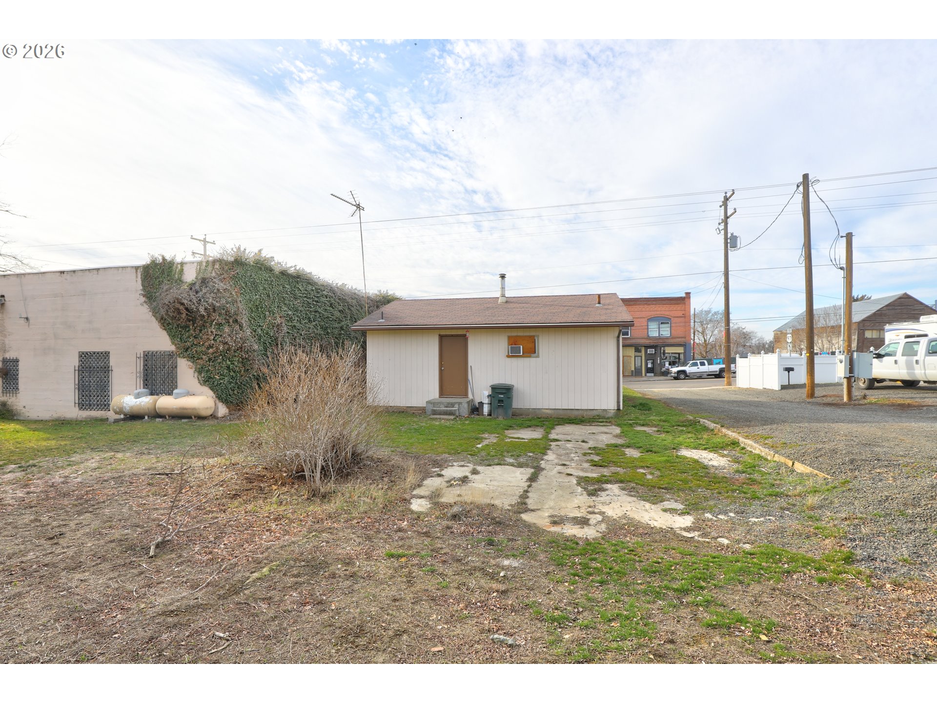 1013 Clark Street Wasco, OR 97065 - Photo 19 of 19 a view of a house with a yard