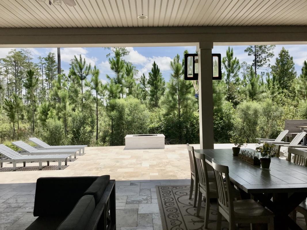 90 Nyes Place St. Augustine, FL 32092 - Photo 11 of 32 a outdoor dining space with furniture and outdoor view
