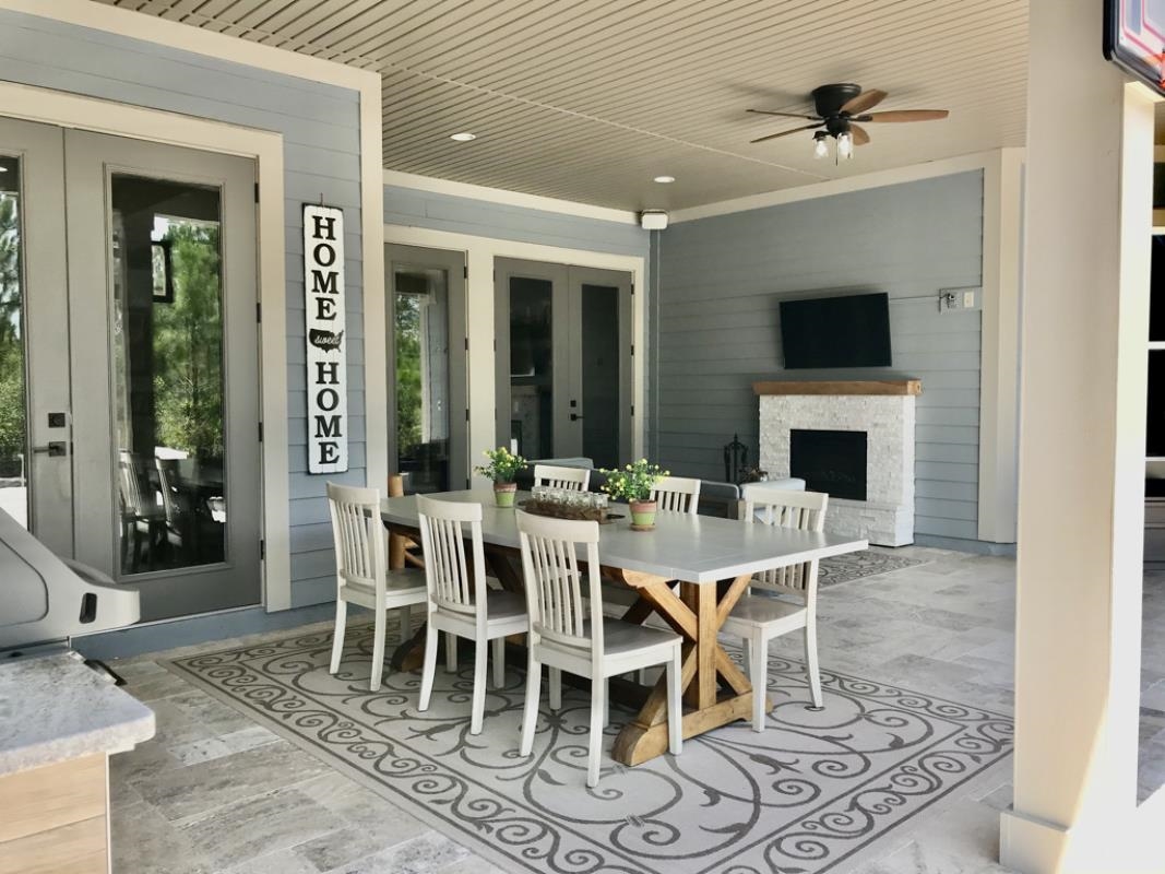 90 Nyes Place St. Augustine, FL 32092 - Photo 12 of 32 a view of a dining room with furniture window and wooden floor