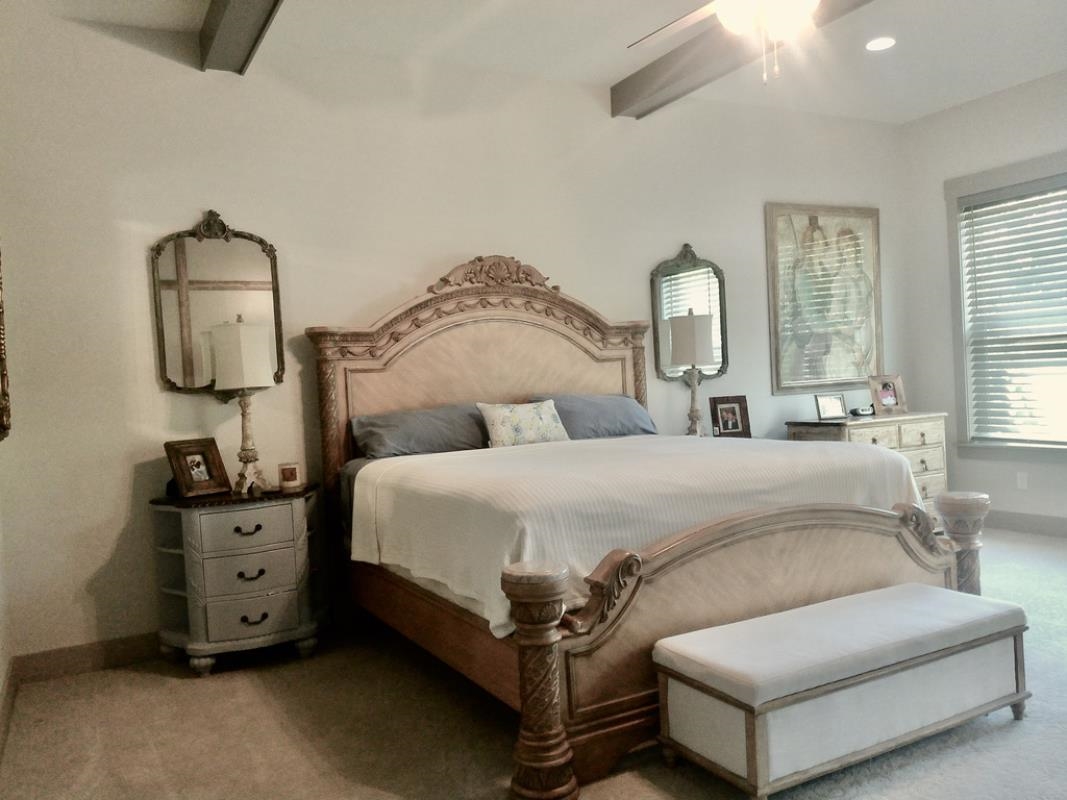 90 Nyes Place St. Augustine, FL 32092 - Photo 14 of 32 a spacious bedroom with a bed and window