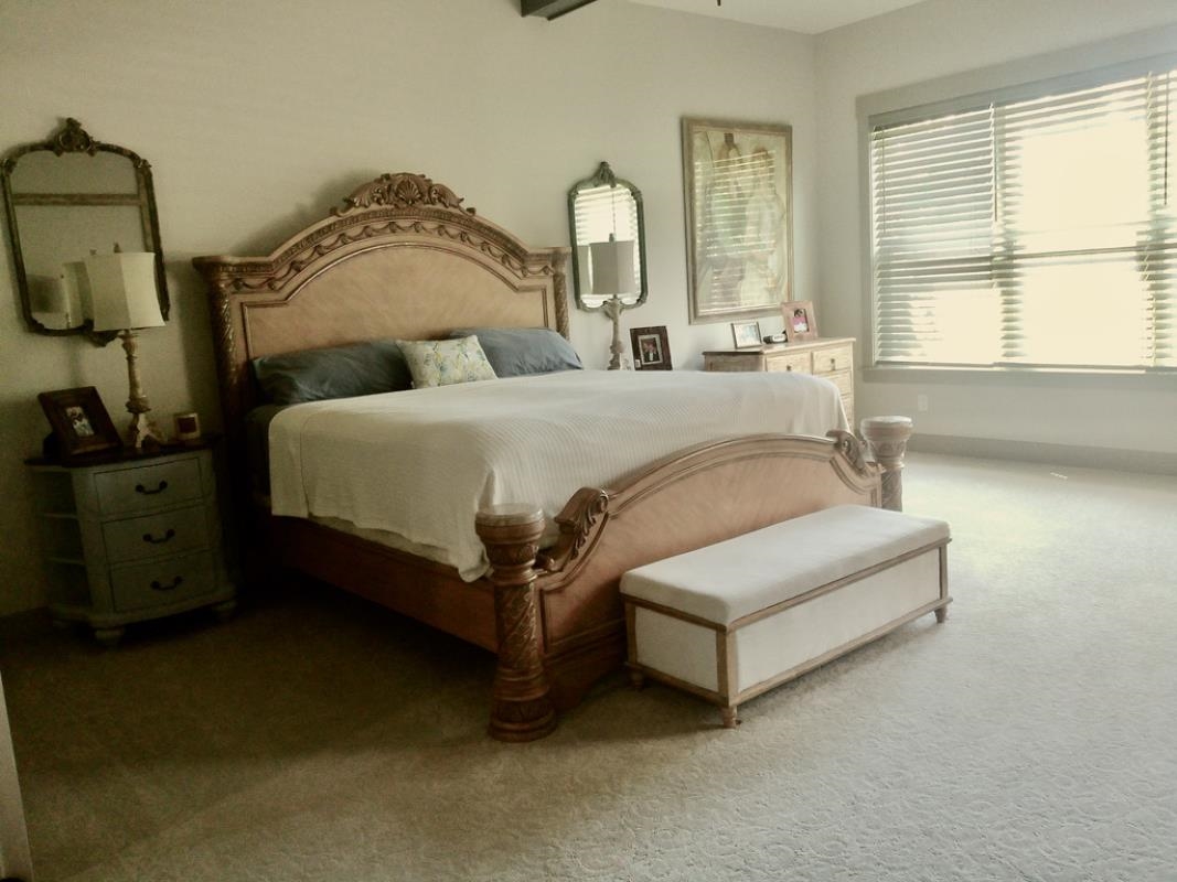 90 Nyes Place St. Augustine, FL 32092 - Photo 15 of 32 a spacious bedroom with a bed and window