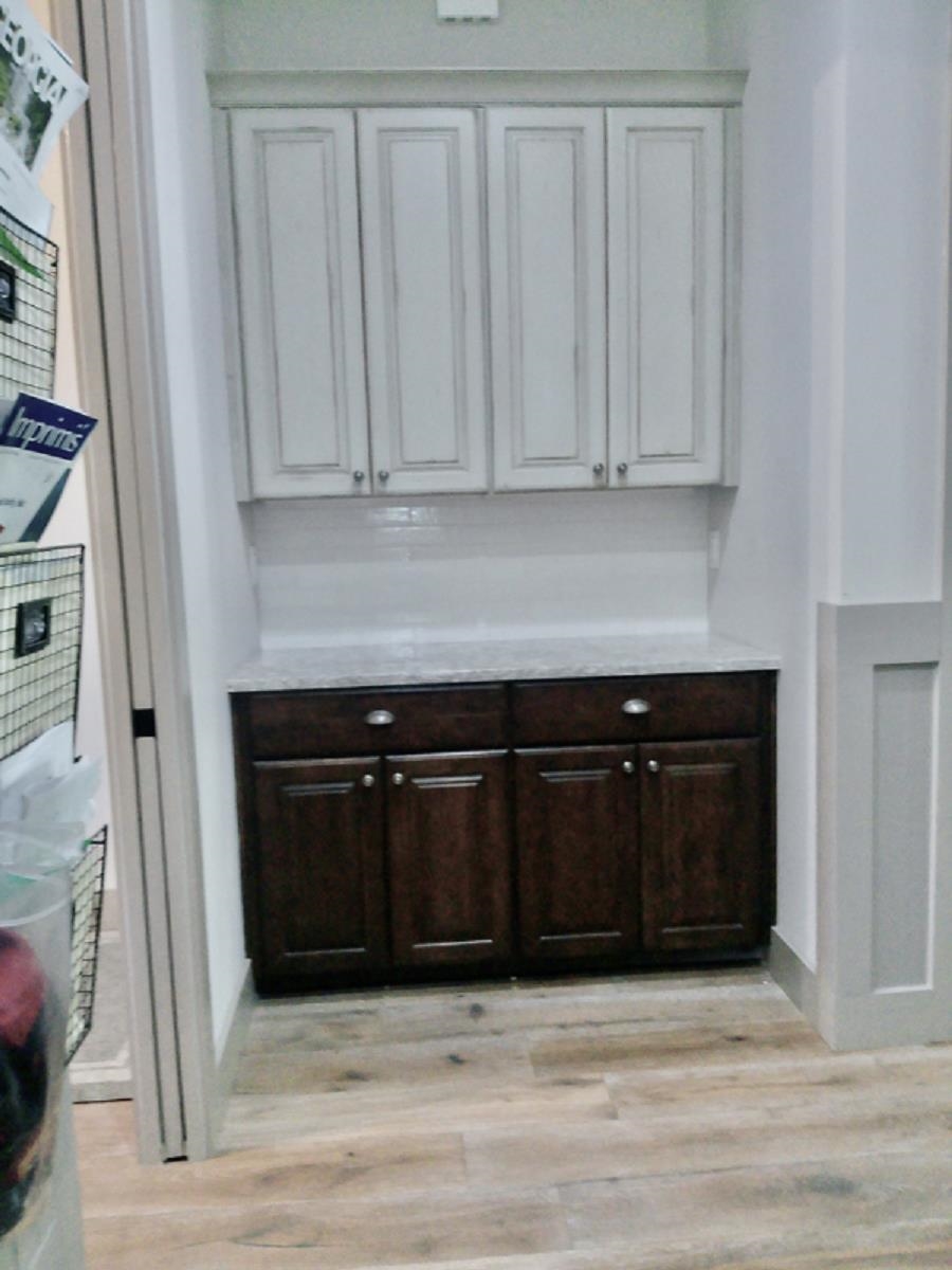 90 Nyes Place St. Augustine, FL 32092 - Photo 21 of 32 a view of a kitchen with wooden cabinet