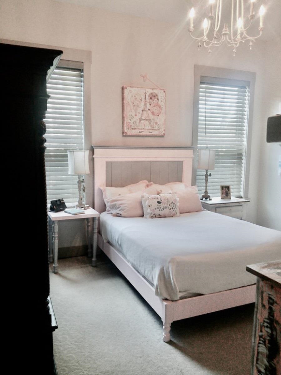 90 Nyes Place St. Augustine, FL 32092 - Photo 24 of 32 a bedroom with a bed and a window