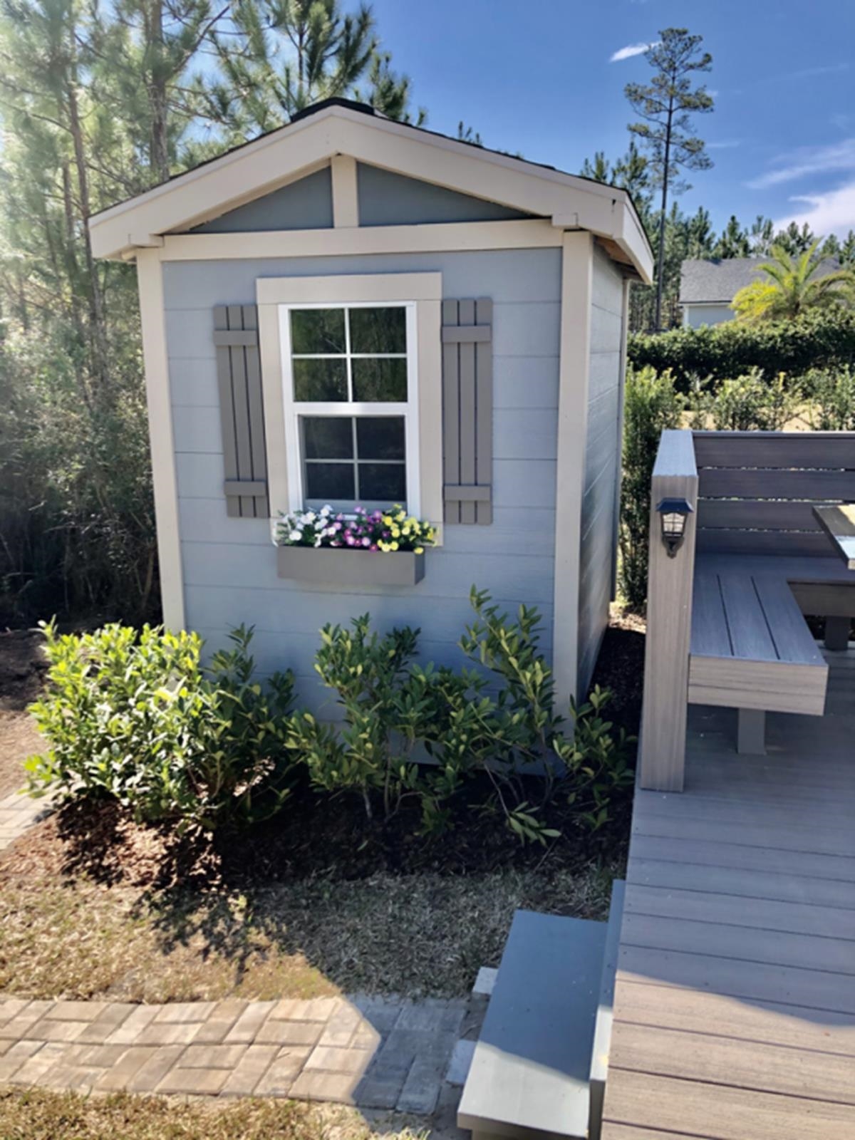 90 Nyes Place St. Augustine, FL 32092 - Photo 28 of 32 a front view of a house with garden