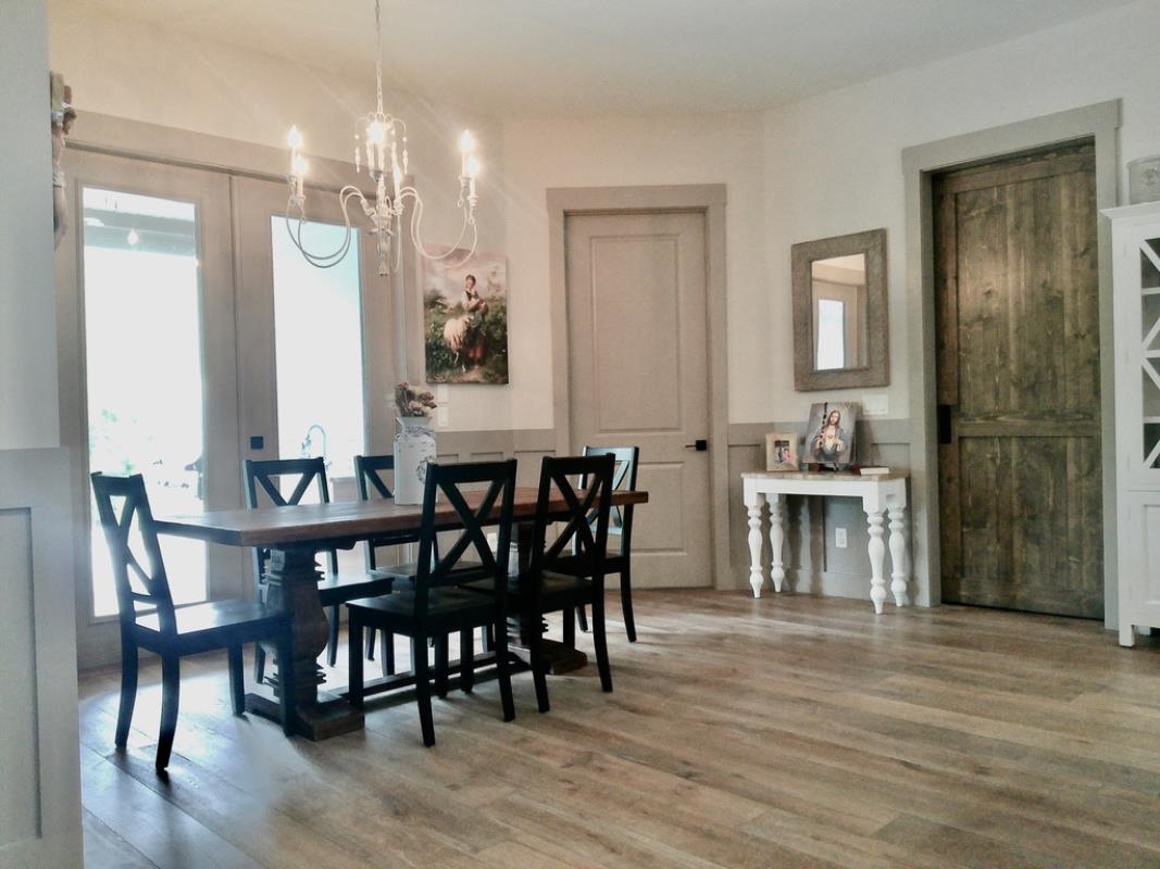 90 Nyes Place St. Augustine, FL 32092 - Photo 7 of 32 a view of a dining room with furniture and wooden floor