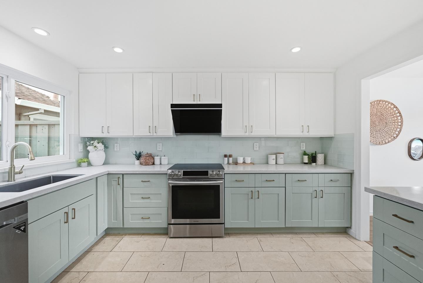 1157 Nimitz Lane Foster City, CA 94404 - Photo 11 of 69 a kitchen with a sink and cabinets