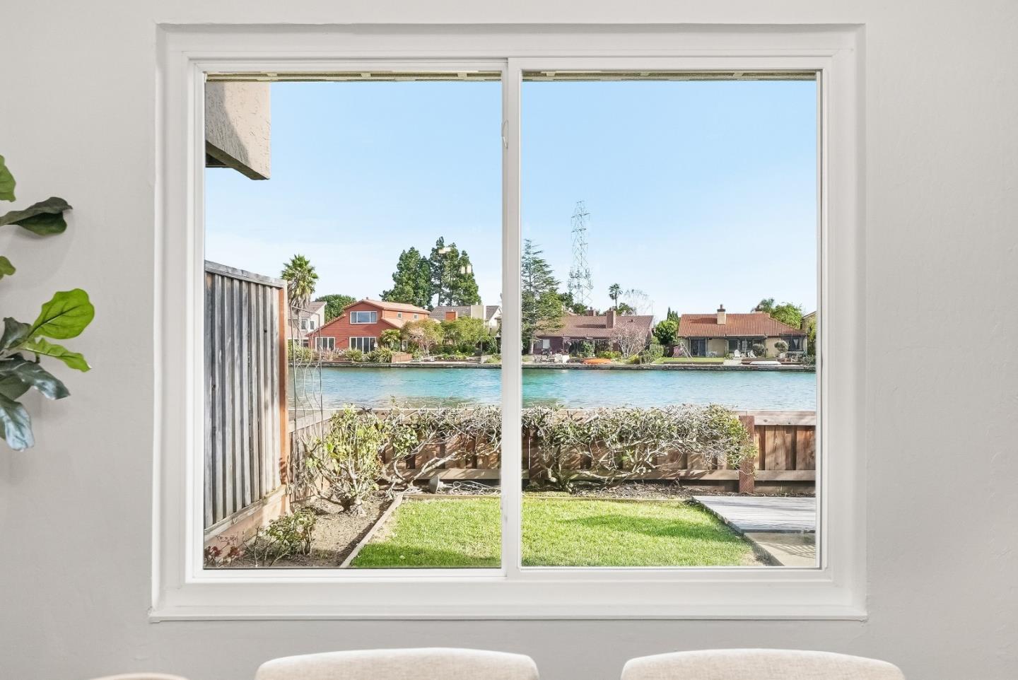 1157 Nimitz Lane Foster City, CA 94404 - Photo 15 of 69 a view of a lake from a window