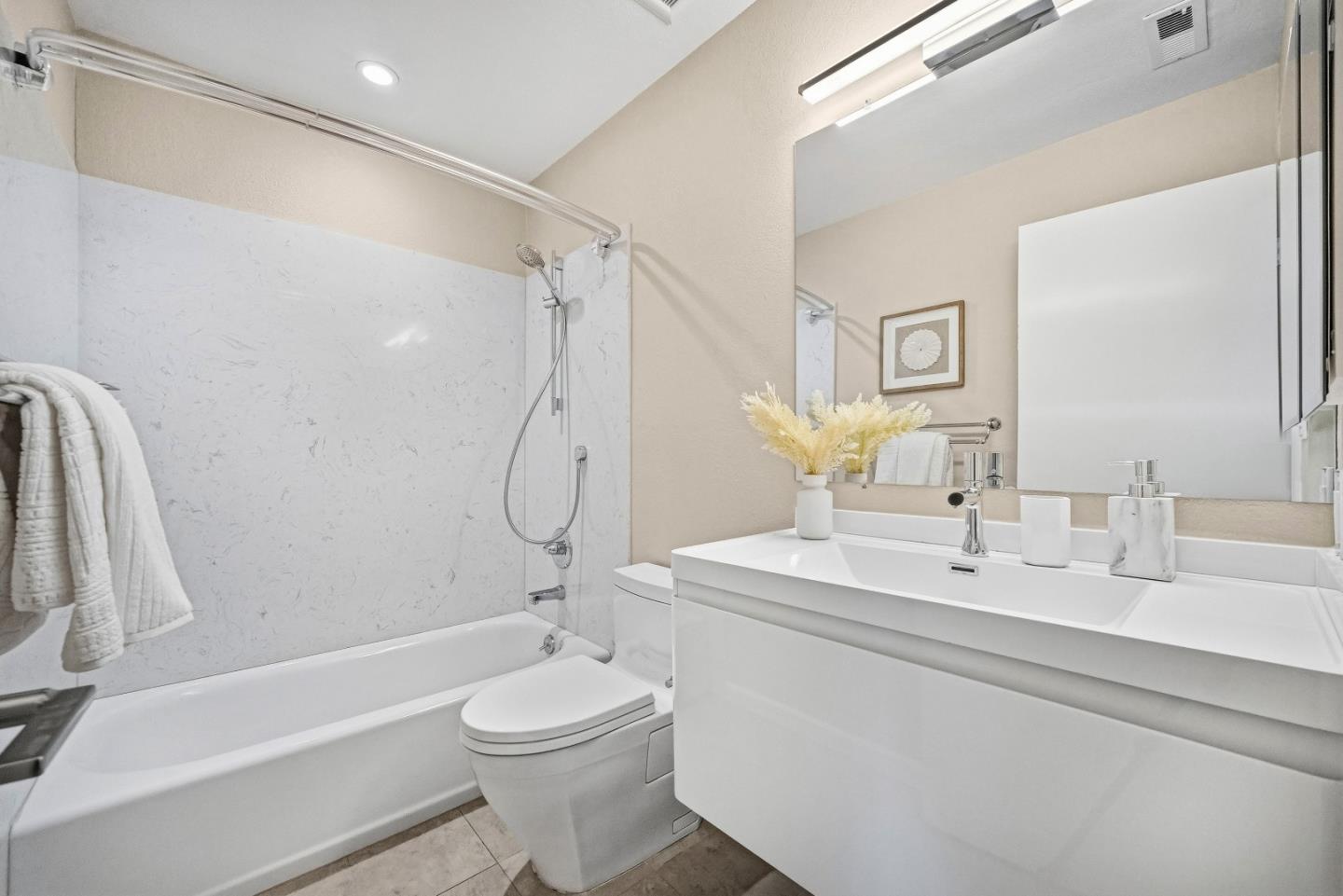 1157 Nimitz Lane Foster City, CA 94404 - Photo 19 of 69 a bathroom with a sink toilet and shower