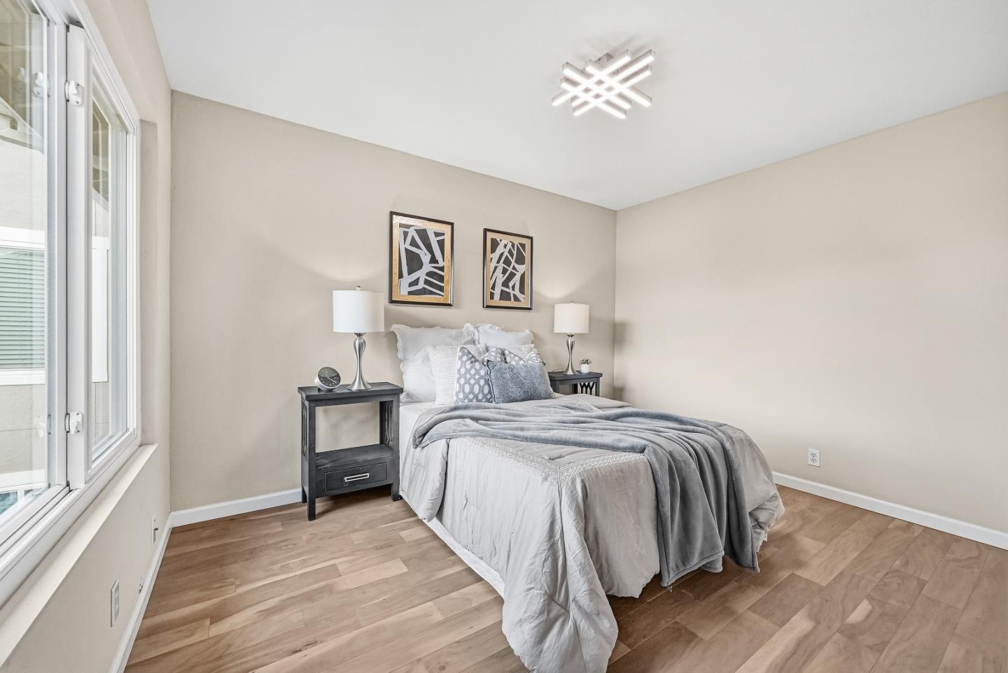 1157 Nimitz Lane Foster City, CA 94404 - Photo 21 of 69 a bedroom with a bed and a window