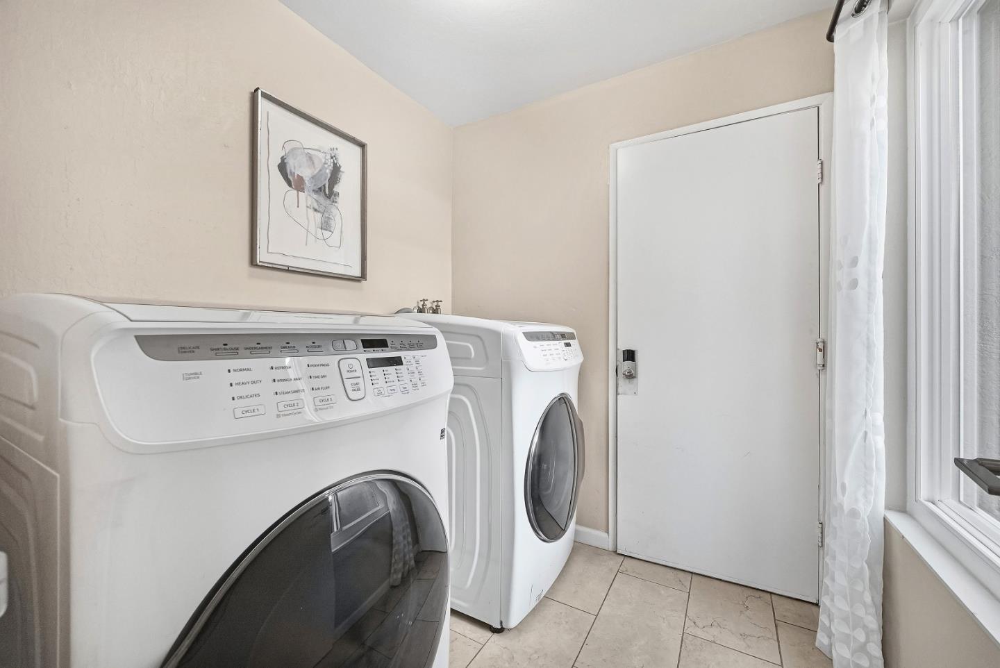1157 Nimitz Lane Foster City, CA 94404 - Photo 29 of 69 a utility room with dryer and washer