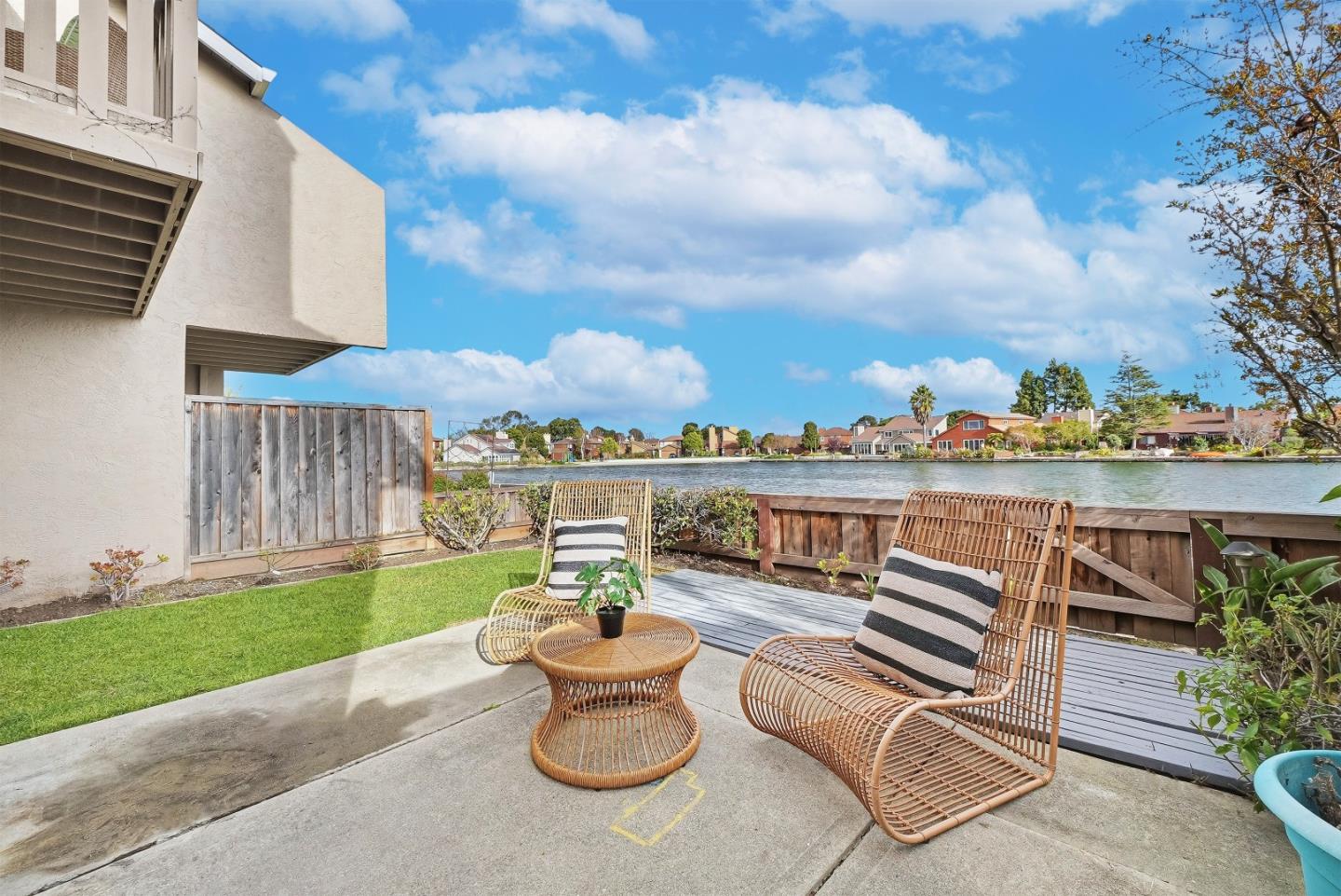 1157 Nimitz Lane Foster City, CA 94404 - Photo 34 of 69 a view of a patio with couches table and chairs and potted plants