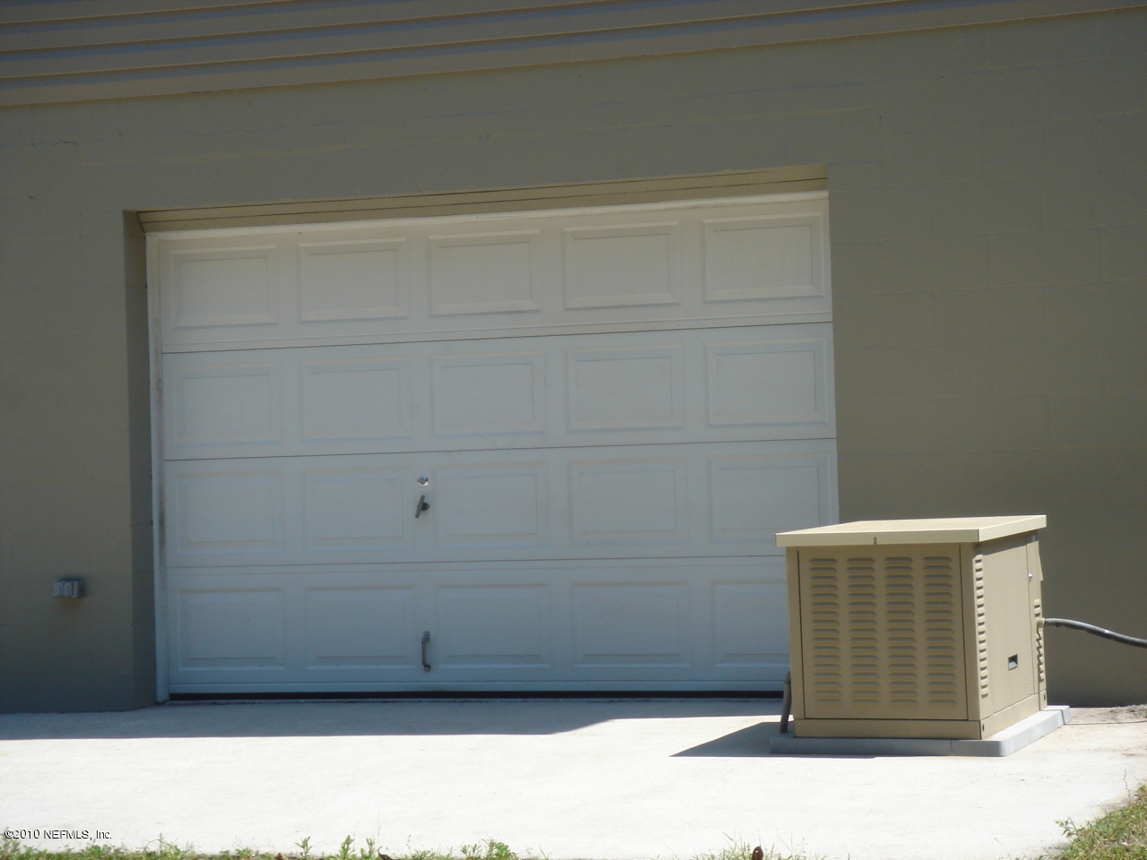 3472 Russell Road Green Cove Springs, FL 32043 - Photo 33 of 42 Garage and Generator connected to home