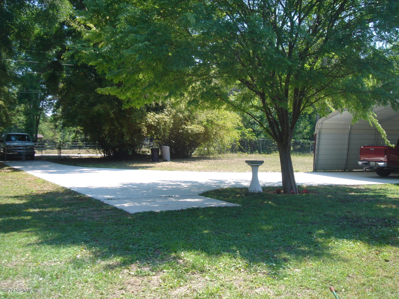 3472 Russell Road Green Cove Springs, FL 32043 - Photo 4 of 42 Front concrete Parking area Carport