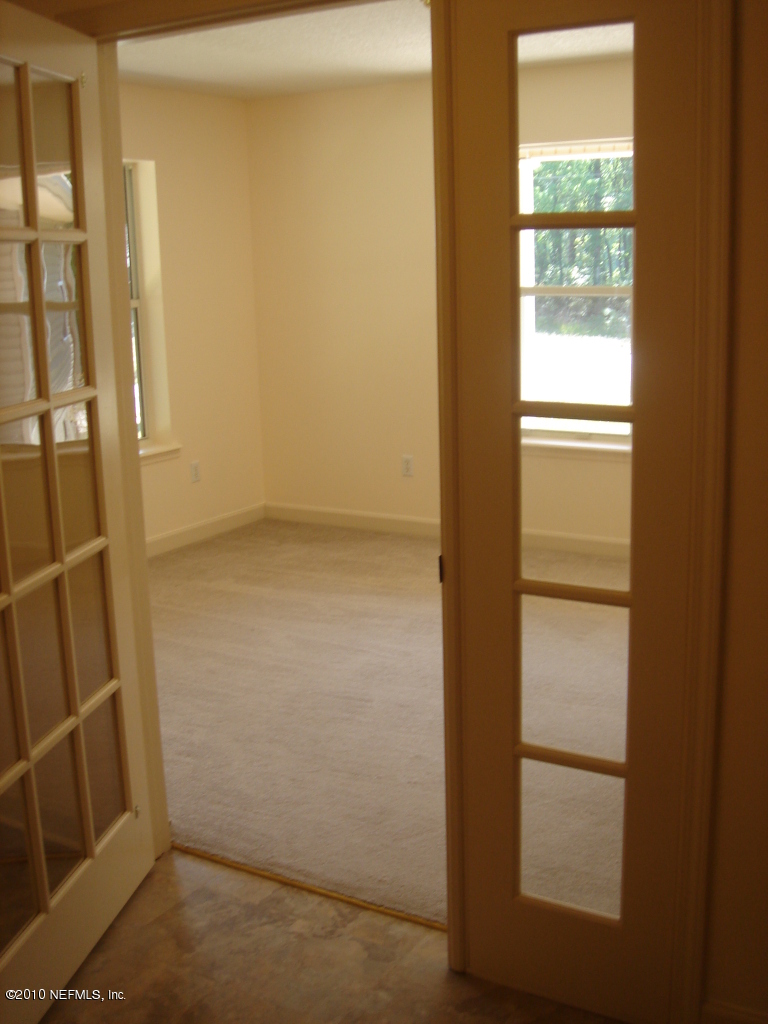 3472 Russell Road Green Cove Springs, FL 32043 - Photo 10 of 42 Formal living or dining or Sunroom
