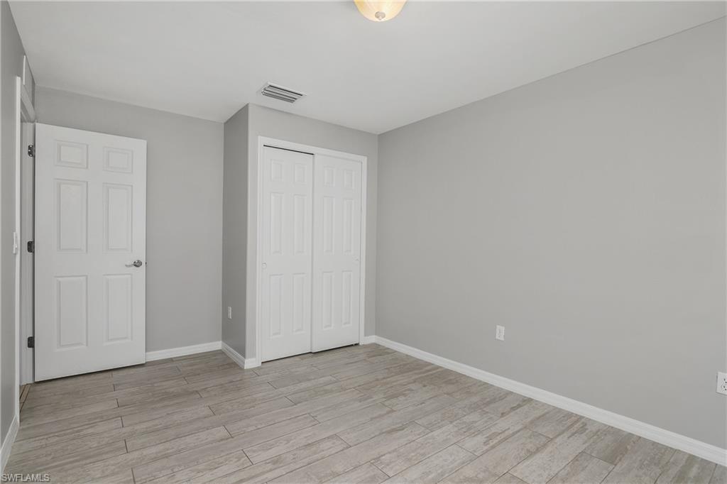 2022 Fairmont Lane Naples, FL 34120 - Photo 17 of 33 a view of an empty room