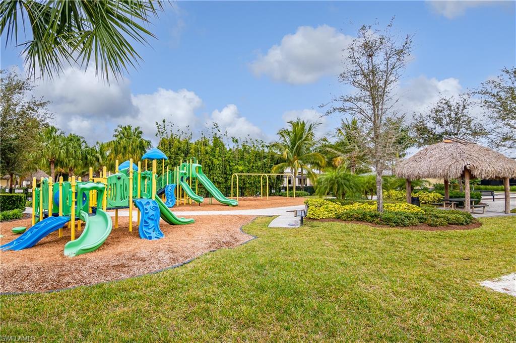 2022 Fairmont Lane Naples, FL 34120 - Photo 30 of 33 a view of a park with swings and slides