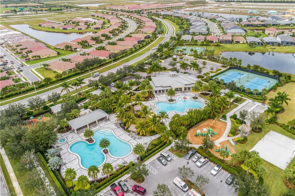 2022 Fairmont Lane Naples, FL 34120 - Photo 31 of 33 an aerial view of residential houses with outdoor space