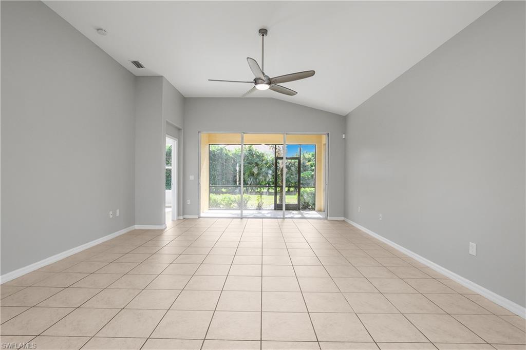 2022 Fairmont Lane Naples, FL 34120 - Photo 9 of 33 a view of an empty room with a window
