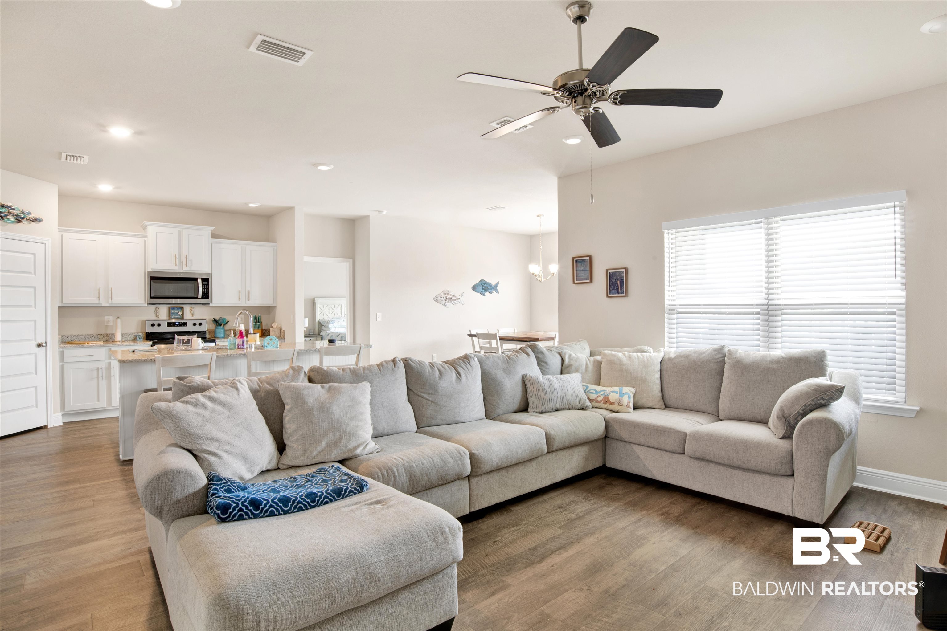 1492 Kairos Loop Foley, AL 36535 - Photo 8 of 24 Living room with hardwood / wood-style floors and ceiling fan