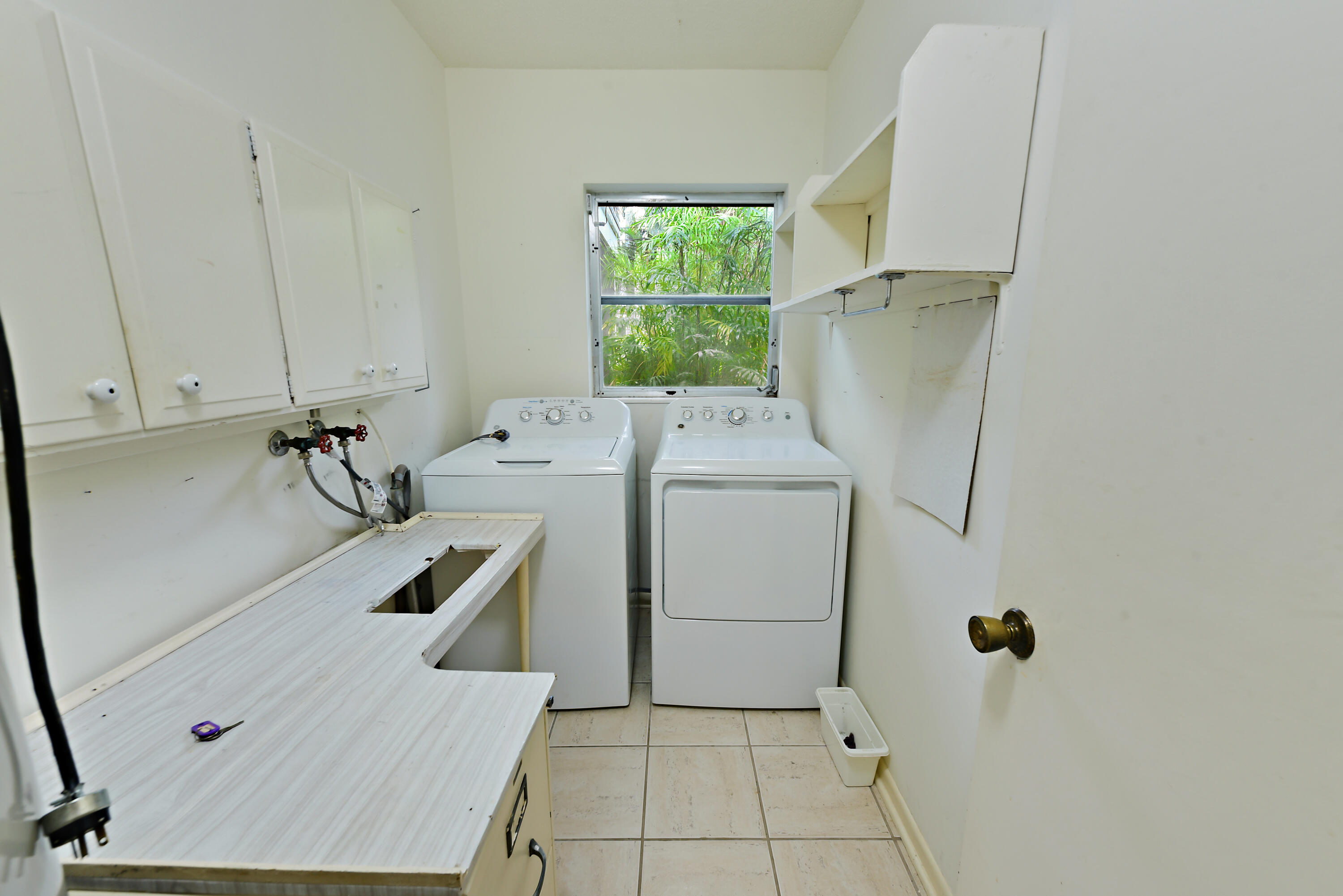324 River Drive Tequesta, FL 33469 - Photo 15 of 28 Inside Laundry Room