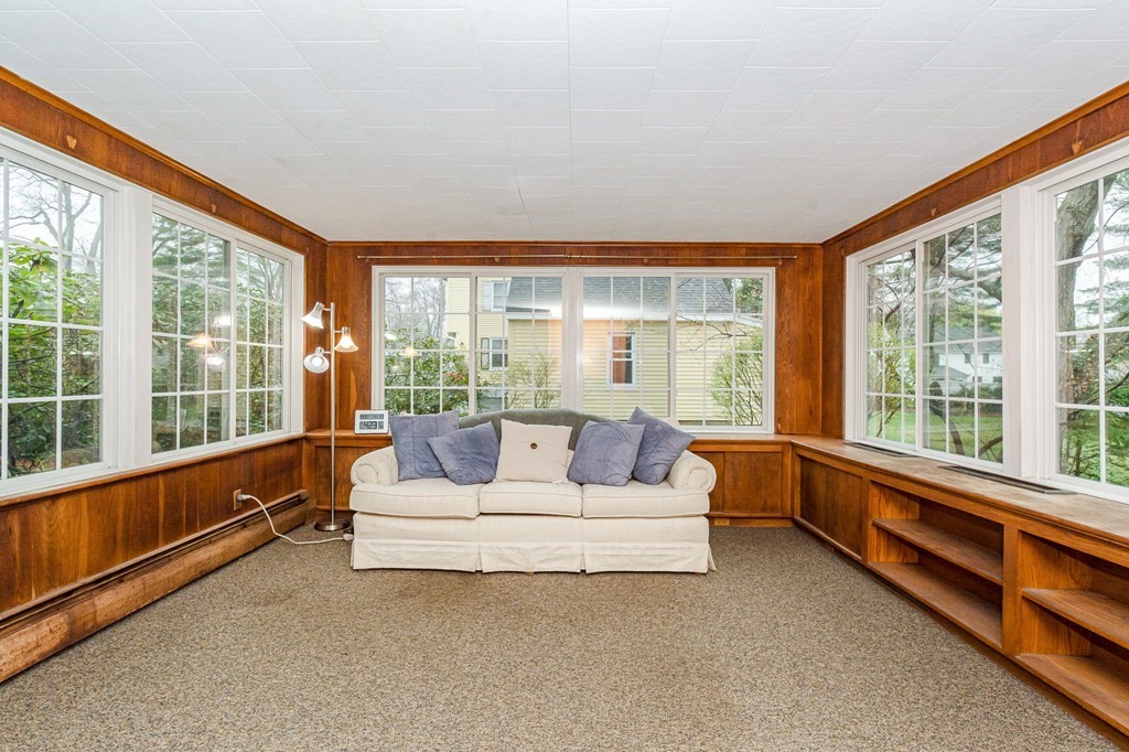 50 Oak Ridge Road Reading, MA 01867 - Photo 14 of 36 a living room with furniture and a large window