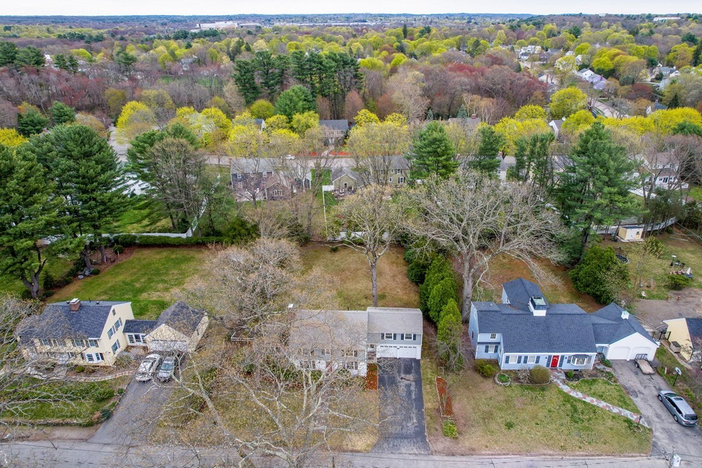 50 Oak Ridge Road Reading, MA 01867 - Photo 33 of 36 an aerial view of a house with garden space and outdoor space